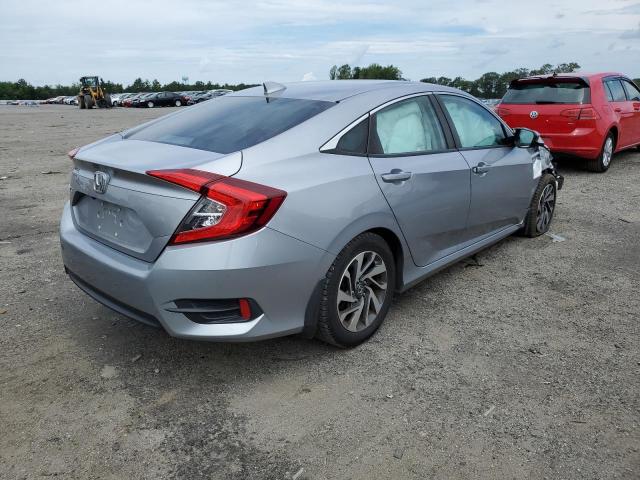 Photo 4 from auction – 2018 HONDA CIVIC EX with VIN 2HGFC2F75JH606555