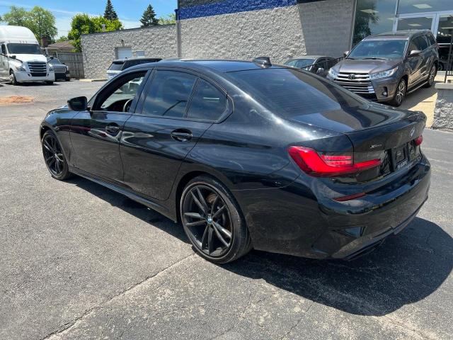 Photo 3 from auction – 2021 BMW M340XI with VIN 3MW5U9J06M8B65993