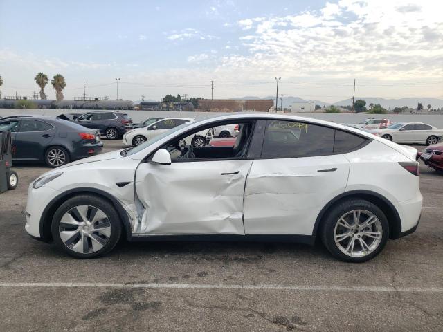 Photo 9 from auction – 2020 TESLA MODEL Y with VIN 5YJYGDEE0LF015601