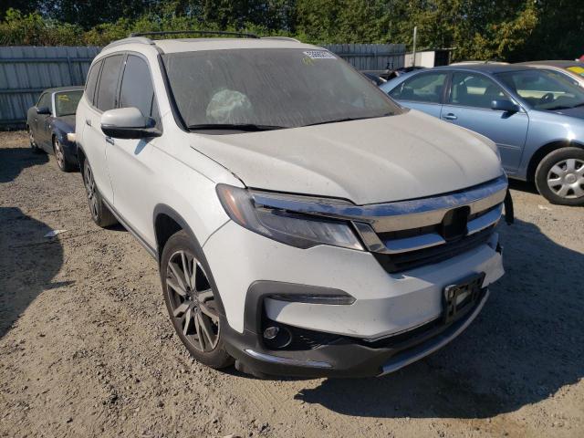 HONDA PILOT ELIT 2020 with VIN 5FNYF6H09LB052080 - Photo from auction