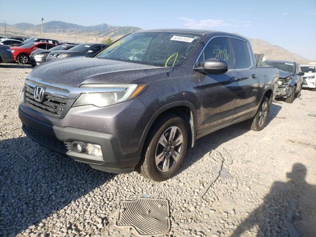 Photo 2 from auction – 2019 HONDA RIDGELINE with VIN 5FPYK3F60KB009786