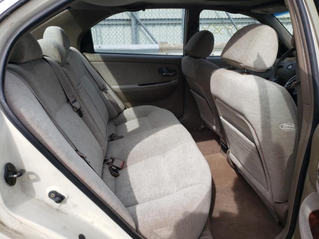 Photo 6 from auction – 2004 KIA OPTIMA LX with VIN KNAGD126145351905