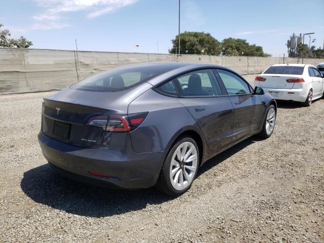 Photo 4 from auction – 2022 TESLA MODEL 3 with VIN 5YJ3E1EB0NF144431