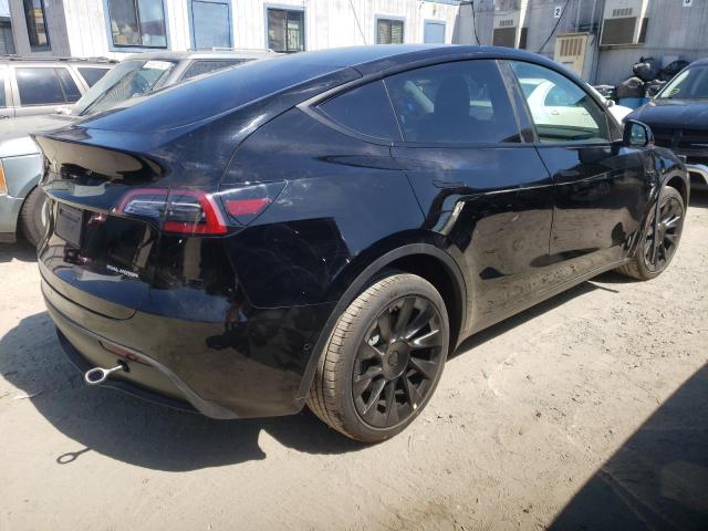 Photo 4 from auction – 2022 TESLA MODEL Y with VIN 7SAYGDEE5NF480123