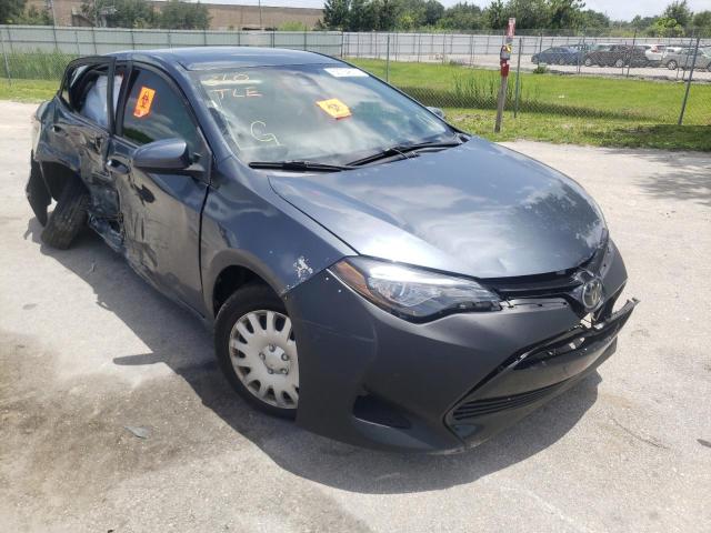 TOYOTA COROLLA 2018 with VIN 5YFBURHE3JP844302 - Photo from auction