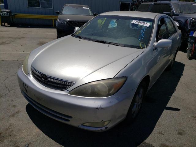 Photo 2 from auction – 2002 TOYOTA CAMRY LE with VIN JTDBE32KX20032743