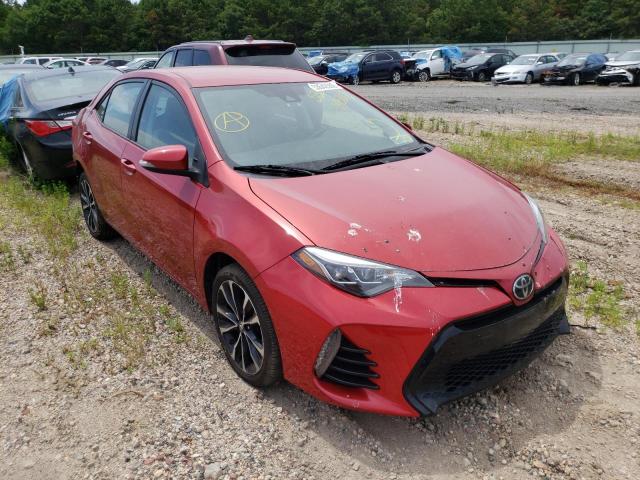 TOYOTA COROLLA L 2017 with VIN 5YFBURHE4HP645818 - Photo from auction