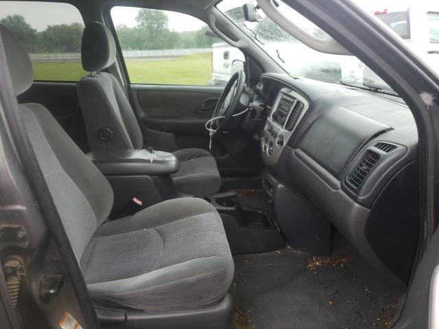 Photo 5 from auction – 2003 MAZDA TRIBUTE LX with VIN 4F2CZ94103KM28671