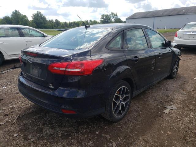 Photo 4 from auction – 2017 FORD FOCUS SE with VIN 1FADP3FE3HL275766