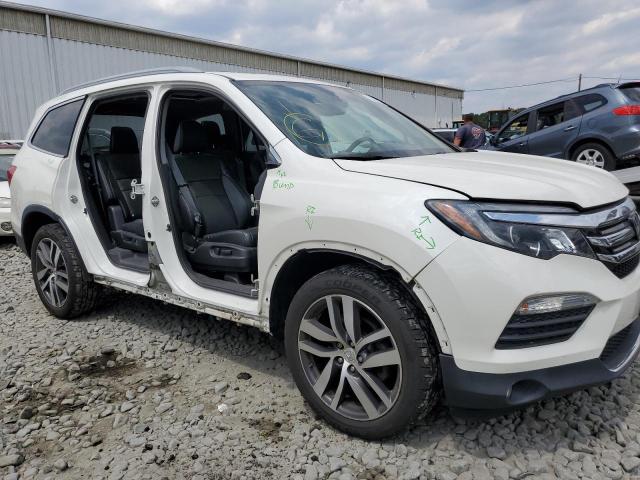 Photo 9 from auction – 2018 HONDA PILOT ELIT with VIN 5FNYF6H05JB022362