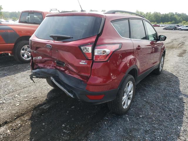 Photo 4 from auction – 2018 FORD ESCAPE SE with VIN 1FMCU9GD5JUC56719