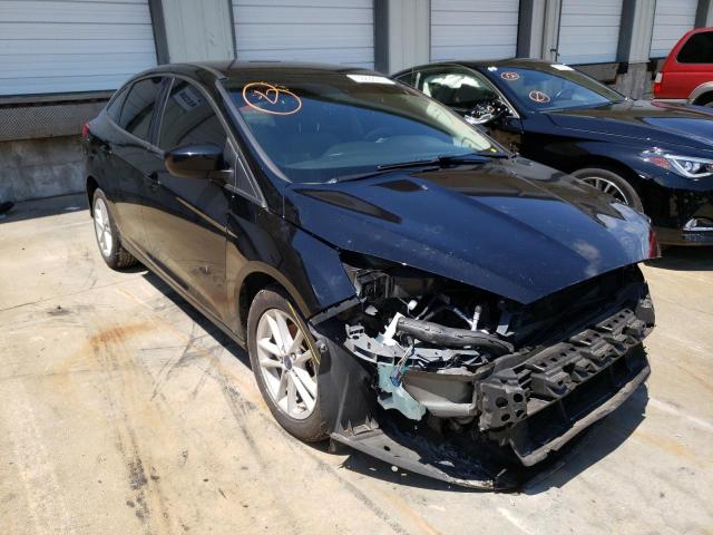 FORD FOCUS SE 2018 with VIN 1FADP3F22JL246061 - Photo from auction
