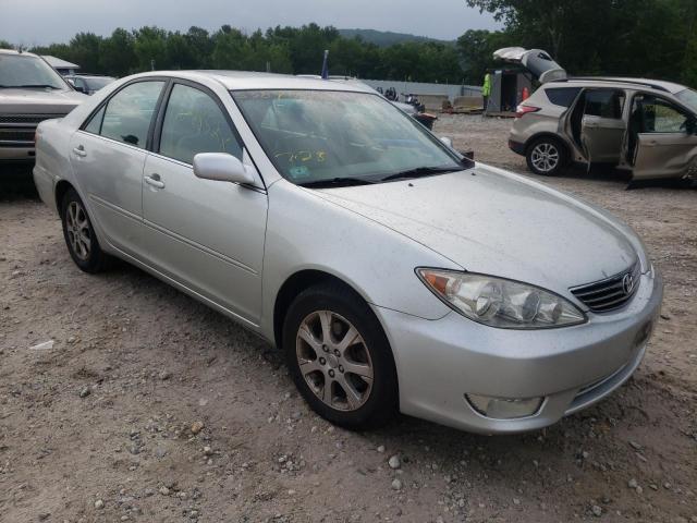 TOYOTA CAMRY LE 2005 with VIN JTDBF30KX50165801 - Photo from auction