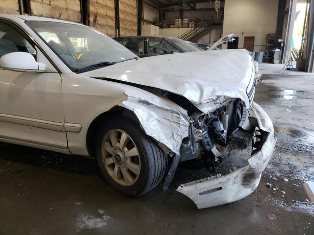 Photo 9 from auction – 2004 KIA OPTIMA LX with VIN KNAGD128745283692