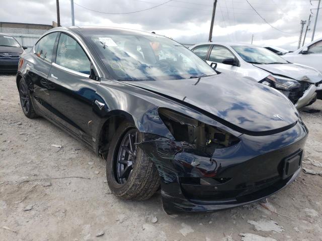 TESLA MODEL 3 2018 with VIN 5YJ3E1EA1JF020668 - Photo from auction