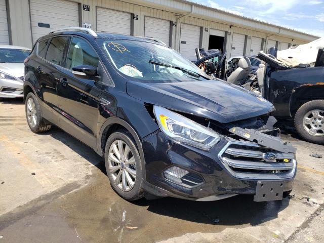 FORD ESCAPE TIT 2017 with VIN 1FMCU9JD9HUE92180 - Photo from auction