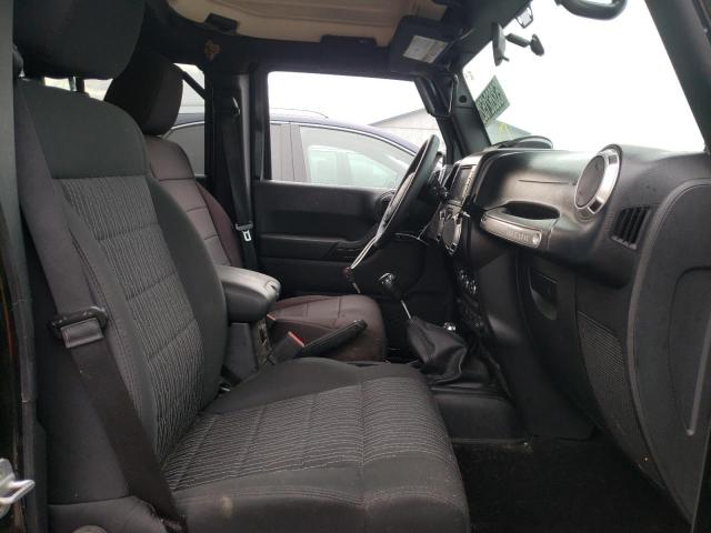 Photo 5 from auction – 2011 JEEP WRANGLER U with VIN 1J4BA5H13BL532984