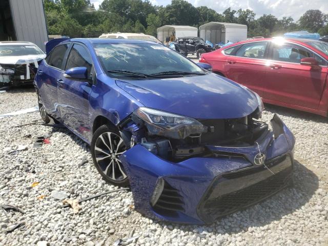 TOYOTA COROLLA L 2019 with VIN 5YFBURHE2KP921582 - Photo from auction