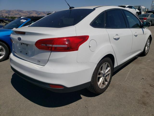 Photo 4 from auction – 2016 FORD FOCUS SE with VIN 1FADP3F29GL254859