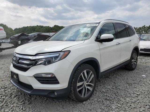 Photo 2 from auction – 2018 HONDA PILOT ELIT with VIN 5FNYF6H05JB022362