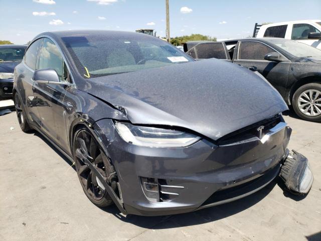 TESLA MODEL X 2020 with VIN 5YJXCBE2XLF263842 - Photo from auction