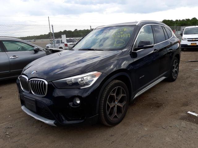 Photo 2 from auction – 2016 BMW X1 XDRIVE2 with VIN WBXHT3C37G5F64829