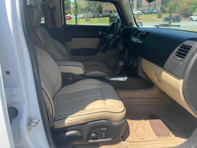 Photo 5 from auction – 2007 HUMMER H3 with VIN 5GTDN13E878135330