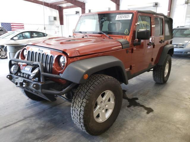 Photo 2 from auction – 2014 JEEP WRANGLER U with VIN 1C4BJWFG5EL303052