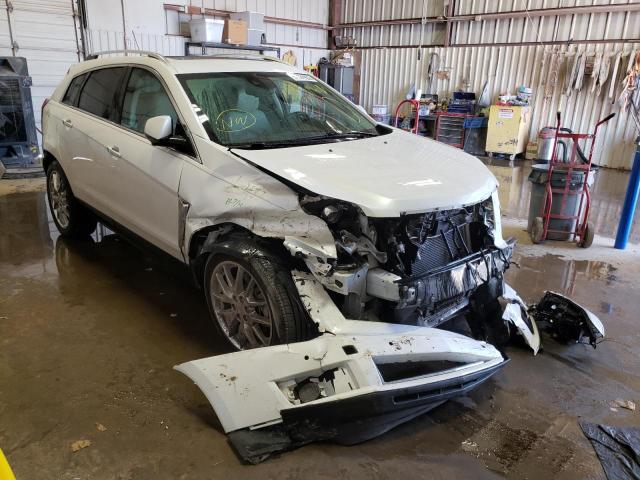 CADILLAC SRX PREMIU 2015 with VIN 3GYFNDE37FS517524 - Photo from auction