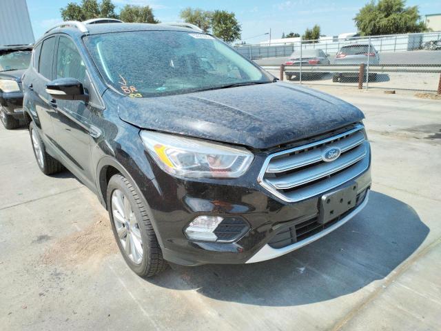 FORD ESCAPE TIT 2017 with VIN 1FMCU9J99HUD42730 - Photo from auction