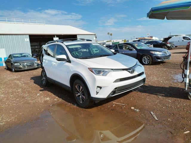 Photo 1 from auction – 2017 TOYOTA RAV4 XLE with VIN 2T3WFREVXHW403699