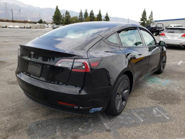 Photo 4 from auction – 2021 TESLA MODEL 3 with VIN 5YJ3E1EA1MF064559