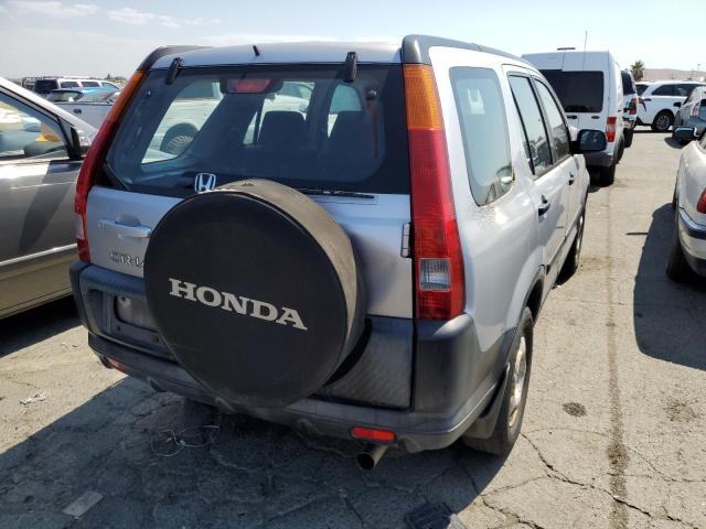Photo 4 from auction – 2002 HONDA CR-V LX with VIN JHLRD68422C018977
