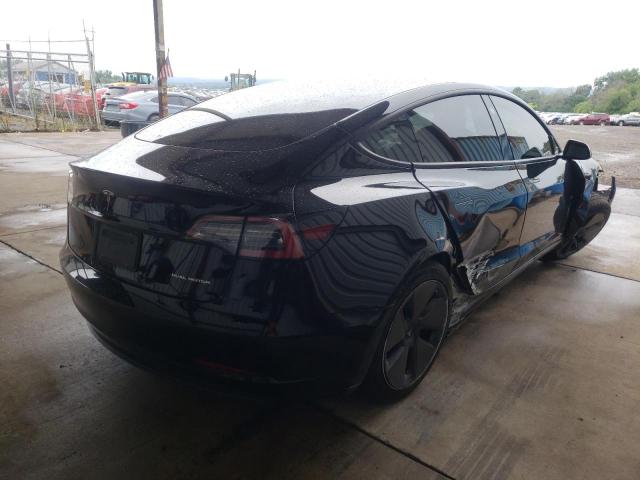 Photo 4 from auction – 2021 TESLA MODEL 3 with VIN 5YJ3E1EB9MF012850