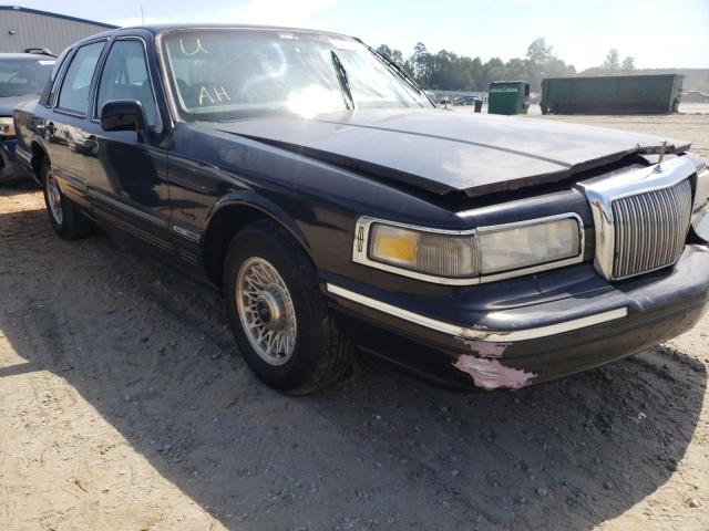 LINCOLN TOWN CAR E 1997 with VIN 1LNLM81W1VY730619 - Photo from auction