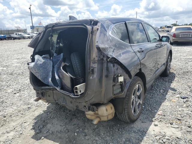 Photo 4 from auction – 2017 HONDA CR-V EX with VIN 7FARW1H55HE011850