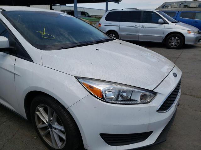 Photo 9 from auction – 2018 FORD FOCUS SE with VIN 1FADP3F2XJL273511