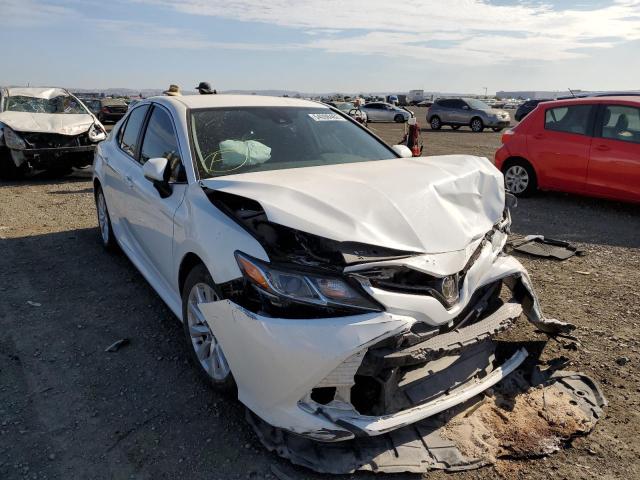 TOYOTA CAMRY LE 2020 with VIN 4T1C11AK0LU984095 - Photo from auction