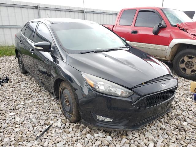 FORD FOCUS SE 2015 with VIN 1FADP3F26FL264330 - Photo from auction