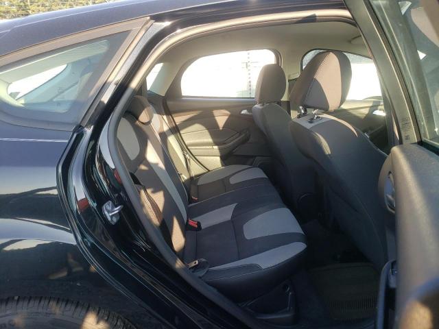 Foto 6 de la subasta – 2014 FORD FOCUS SE con VIN 1FADP3K28EL309191