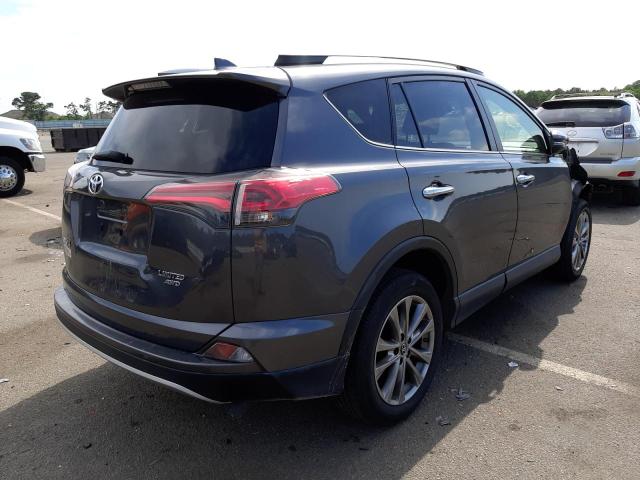 Photo 4 from auction – 2018 TOYOTA RAV4 LIMIT with VIN JTMDFREV8JD233921