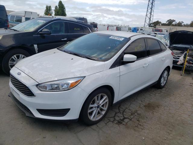 Photo 2 from auction – 2018 FORD FOCUS SE with VIN 1FADP3F2XJL273511