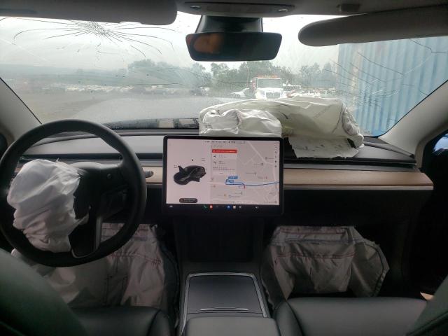 Photo 7 from auction – 2021 TESLA MODEL 3 with VIN 5YJ3E1EB9MF012850