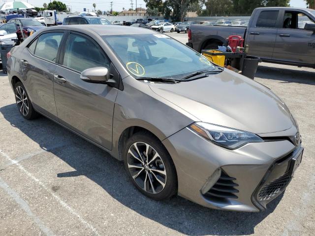 TOYOTA COROLLA L 2019 with VIN 5YFBURHE5KP909023 - Photo from auction