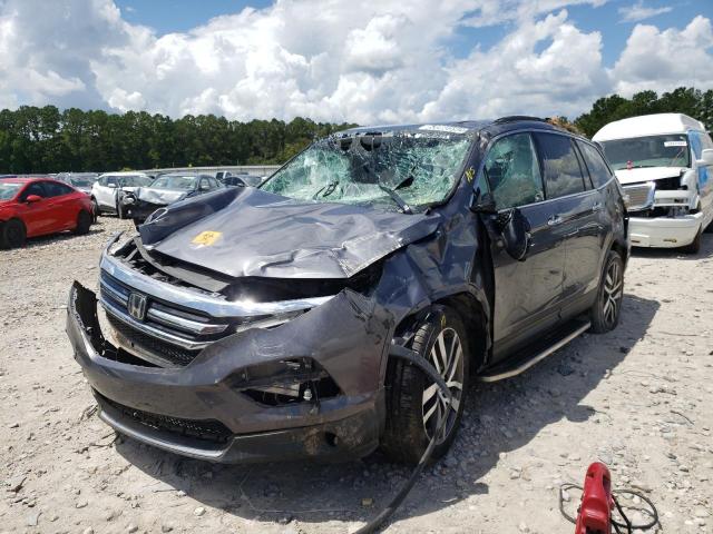 Photo 2 from auction – 2016 HONDA PILOT TOUR with VIN 5FNYF5H96GB050351