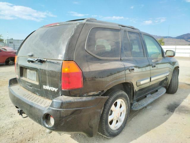 Photo 4 from auction – 2004 GMC ENVOY with VIN 1GKDS13S142100718