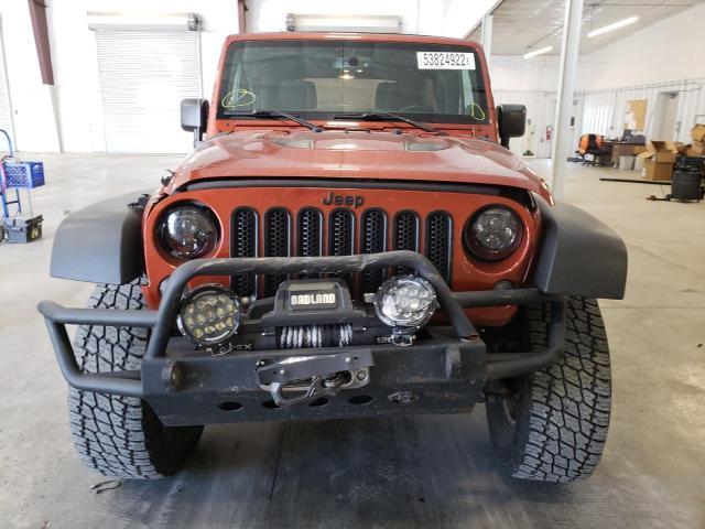 Photo 9 from auction – 2014 JEEP WRANGLER U with VIN 1C4BJWFG5EL303052