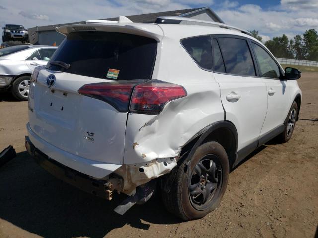 Photo 4 from auction – 2016 TOYOTA RAV4 LE with VIN JTMBFREV6GJ095460