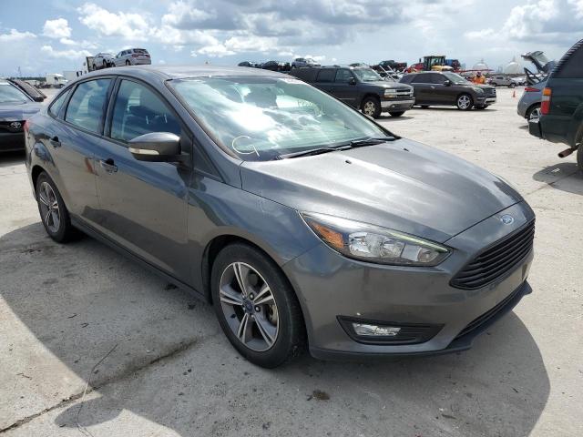 FORD FOCUS SE 2017 with VIN 1FADP3FE2HL294177 - Photo from auction