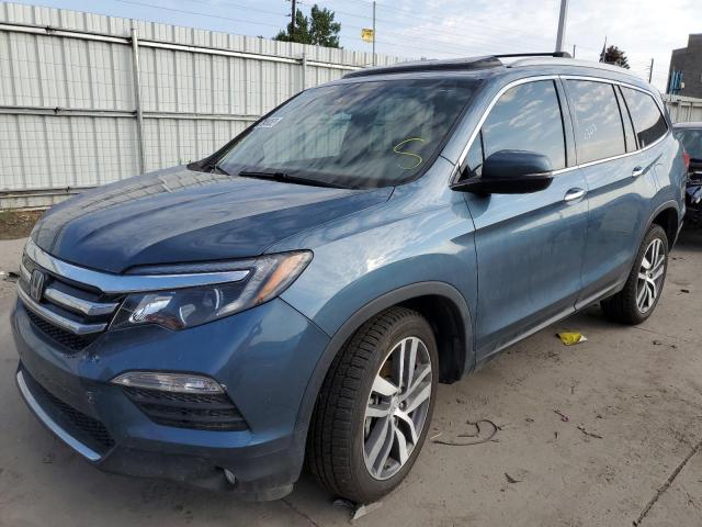 Photo 2 from auction – 2018 HONDA PILOT ELIT with VIN 5FNYF6H03JB064870